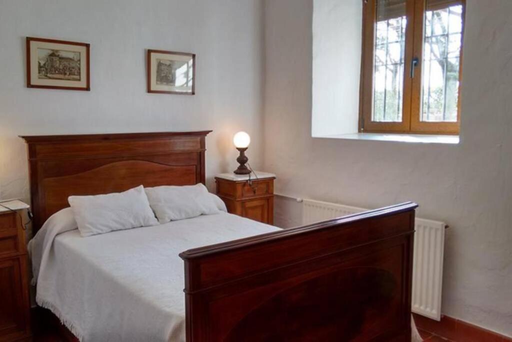 Postel nebo postele na pokoji v ubytování Casa El Carmen