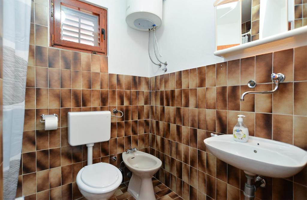 Łazienka w obiekcie Apartments Fazana 407