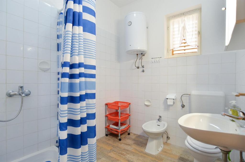 Łazienka w obiekcie Apartments Fazana 407