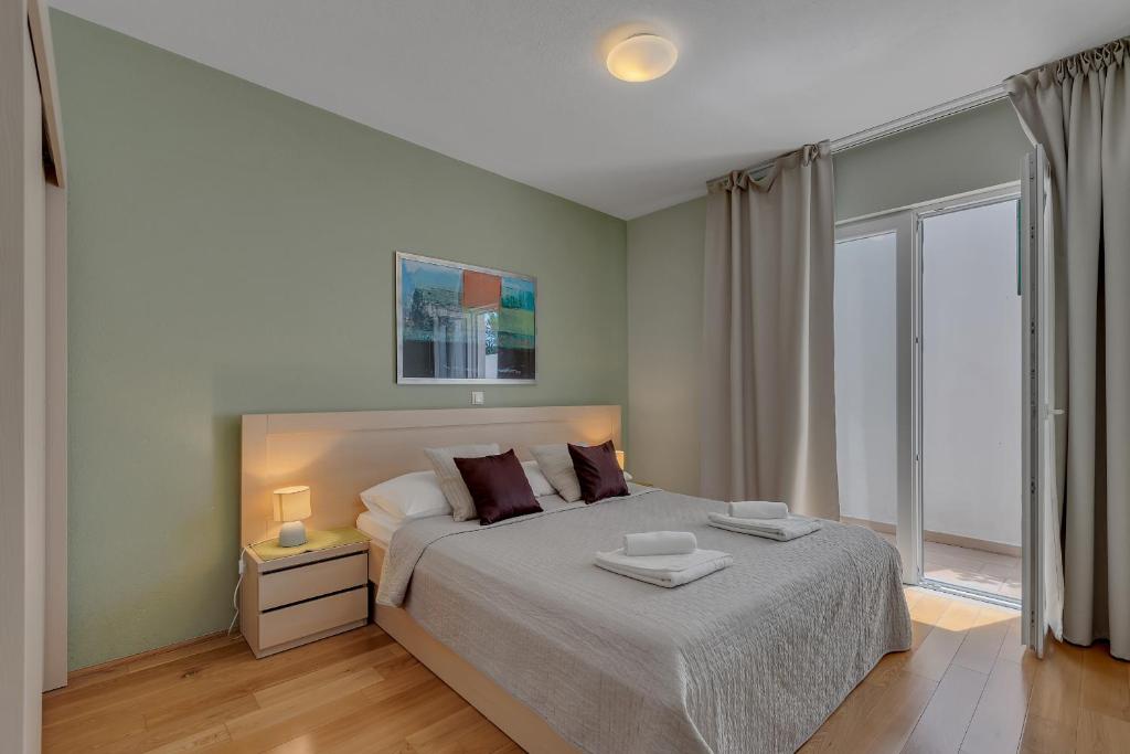 Posteľ alebo postele v izbe v ubytovaní Apartments Vranjes Deluxe