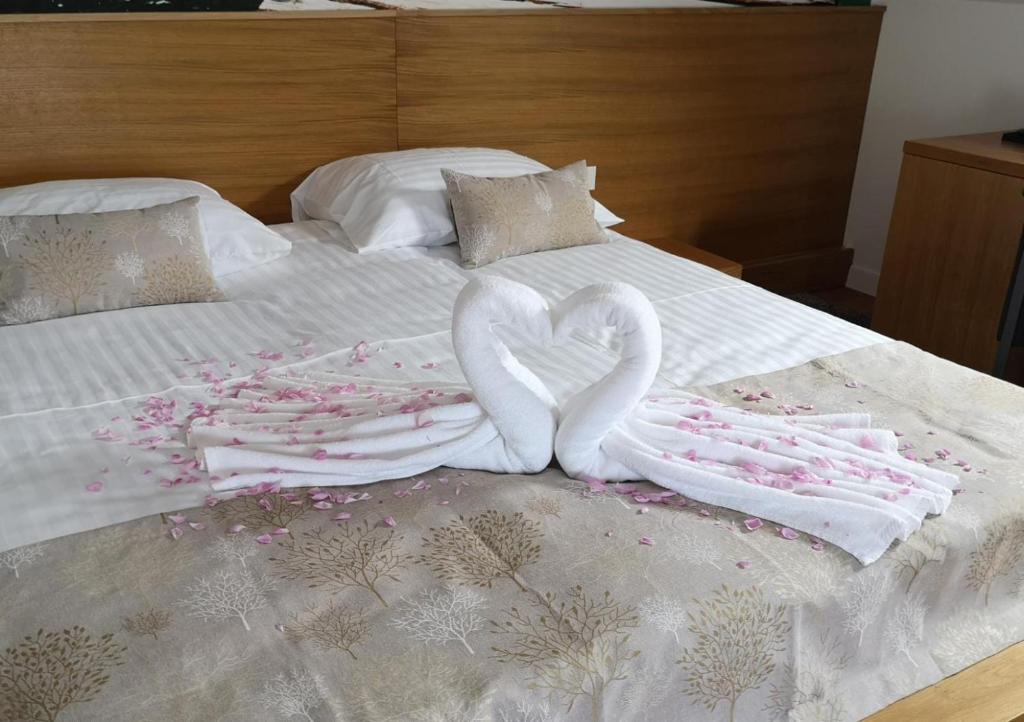 Posteľ alebo postele v izbe v ubytovaní Hotel Palcich Plitvice