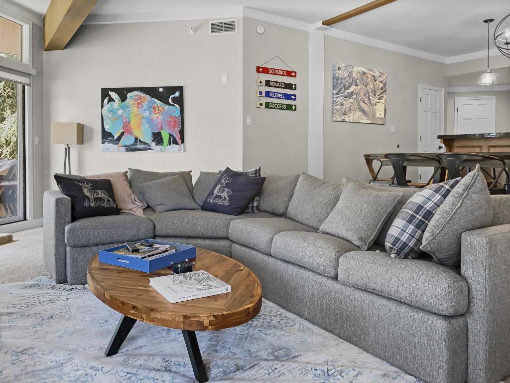 a living room with a couch and a table at B11 Powder Run condo in Park City