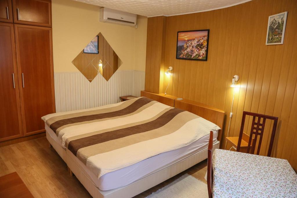 Posteľ alebo postele v izbe v ubytovaní Molnár Apartment