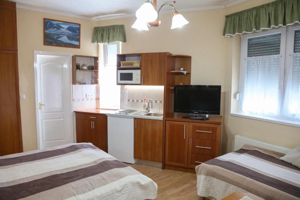 Posteľ alebo postele v izbe v ubytovaní Molnár Apartment