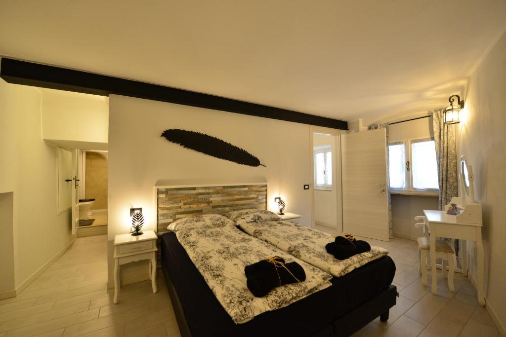 A bed or beds in a room at Residenza al Castello