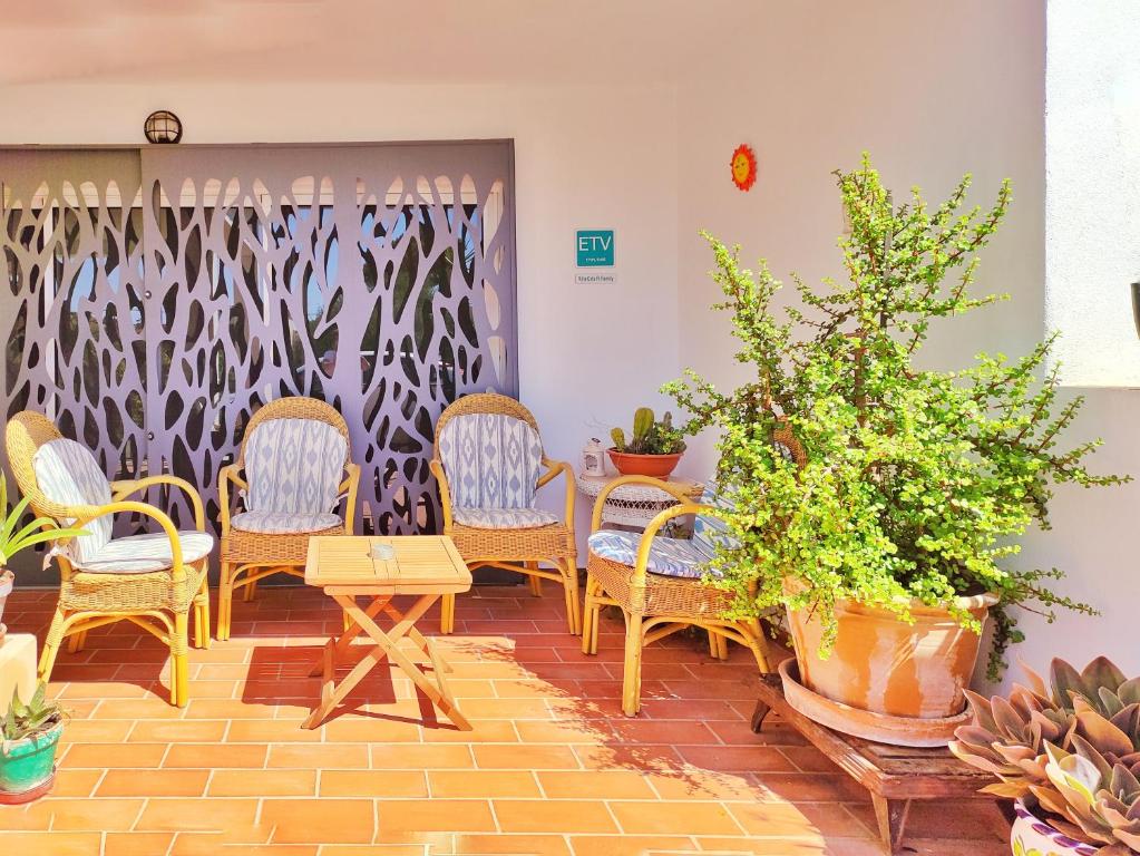 Posezení v ubytování Villa Cala Pi Family