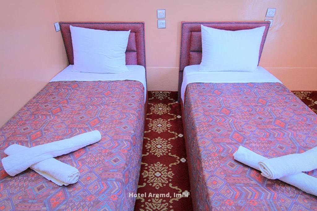 Postel nebo postele na pokoji v ubytování Hotel Igoudar Armed