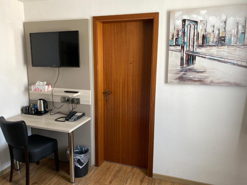 TV/Unterhaltungsangebot in der Unterkunft Center Hotel Essen
