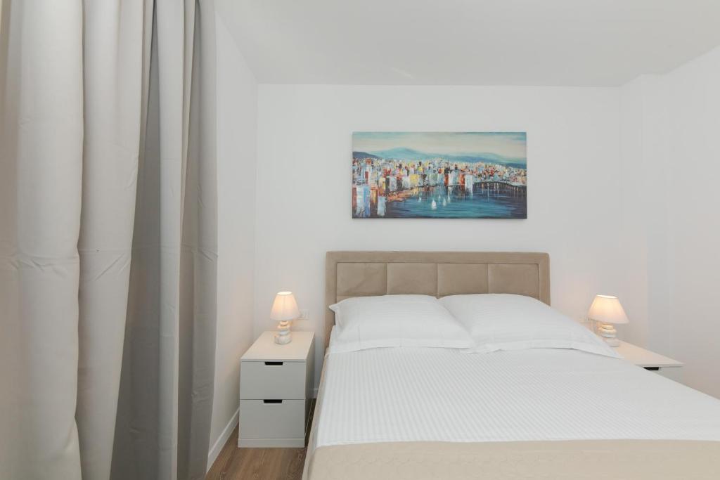 Posteľ alebo postele v izbe v ubytovaní Enjoy Trogir Ciovo