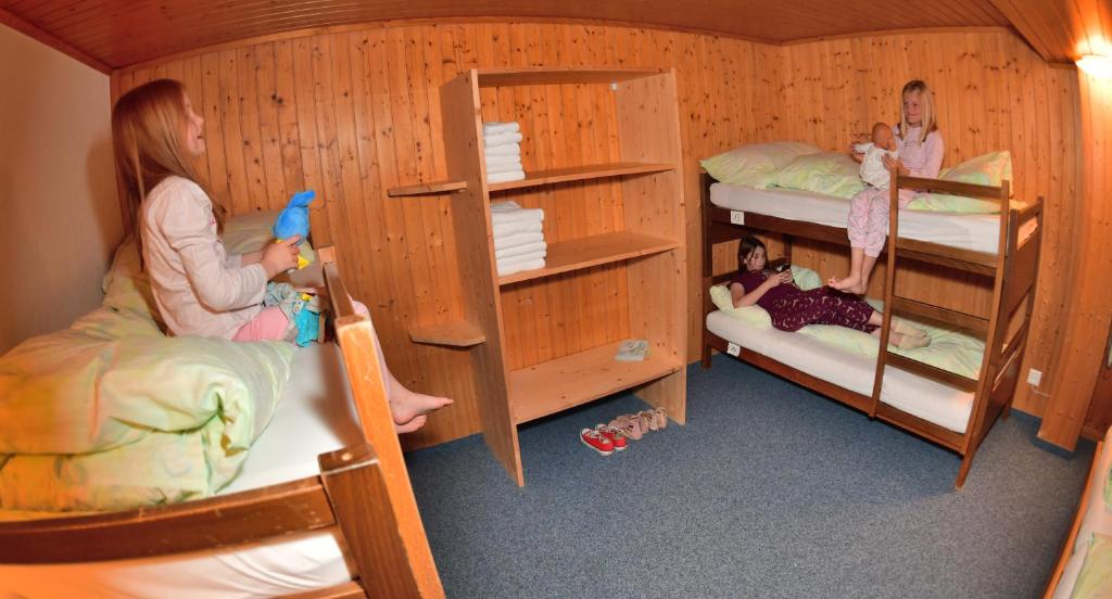 Postel nebo postele na pokoji v ubytování Hotel Wetterhorn