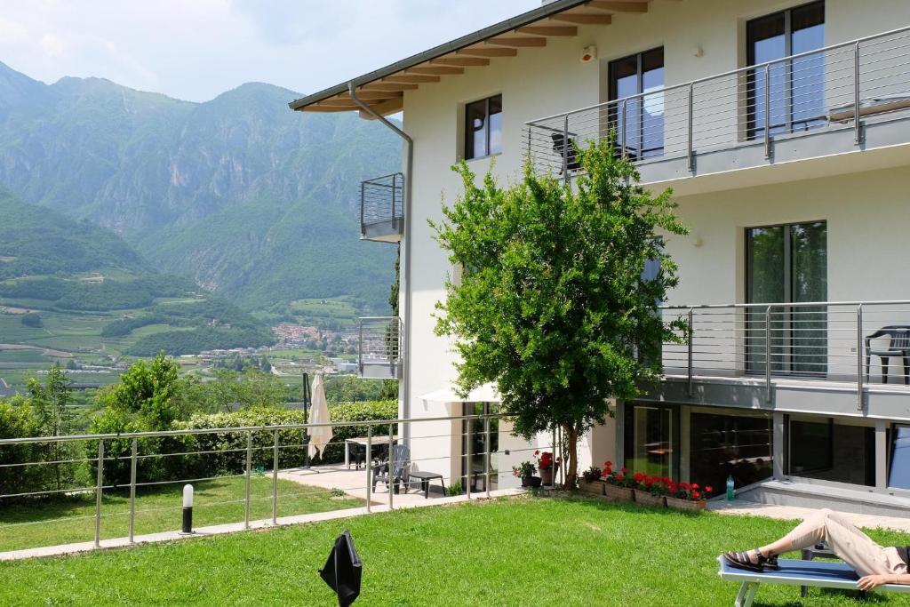 a house with a view of the mountains at In Collina B&B in Trento