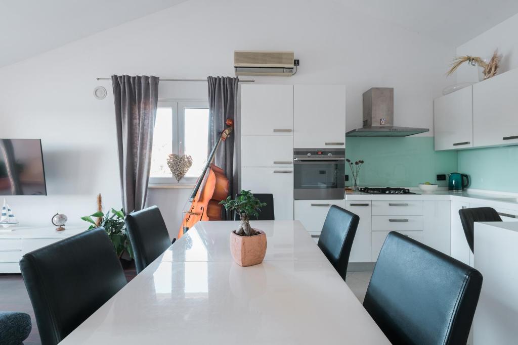 Kuchyň nebo kuchyňský kout v ubytování Accommodation Triton