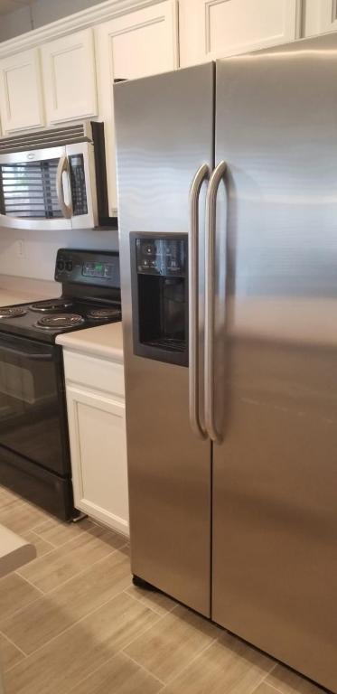Kuchyň nebo kuchyňský kout v ubytování Phoenix comfort home BNB