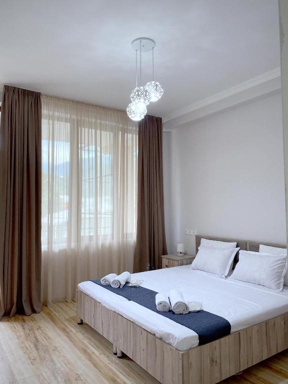 Postel nebo postele na pokoji v ubytování Central Kvareli