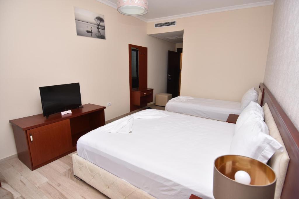 Postel nebo postele na pokoji v ubytování Hotel Summer Stars