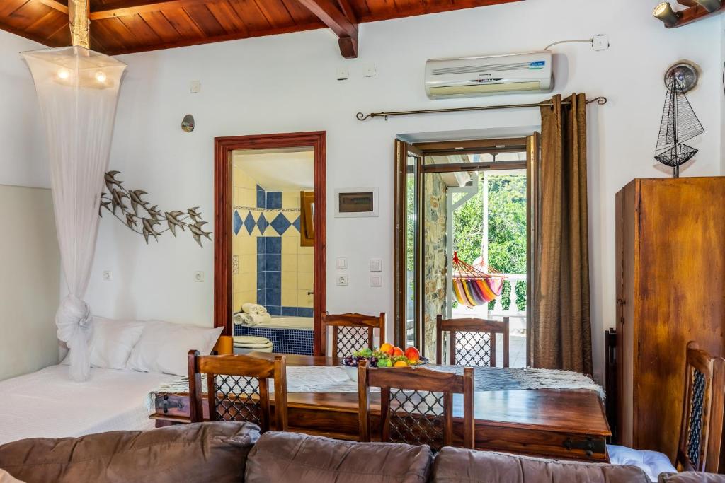 A bed or beds in a room at Konstantina Yard Studio