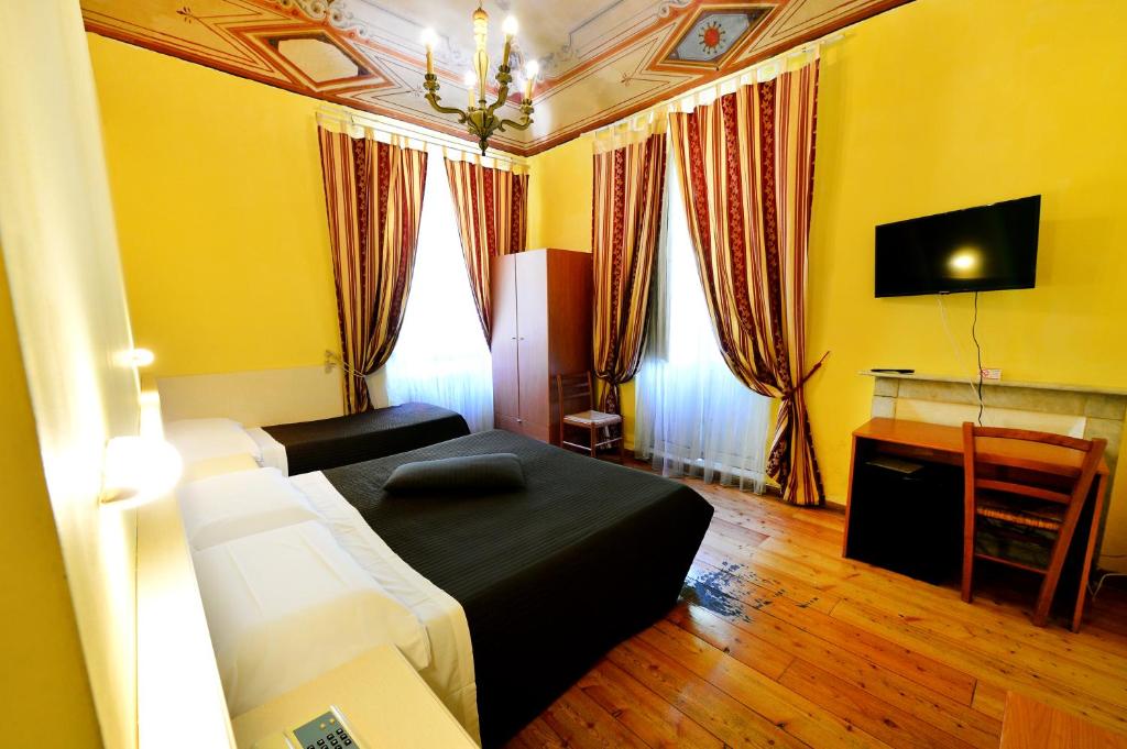 TV a/nebo společenská místnost v ubytování Hotel Iris