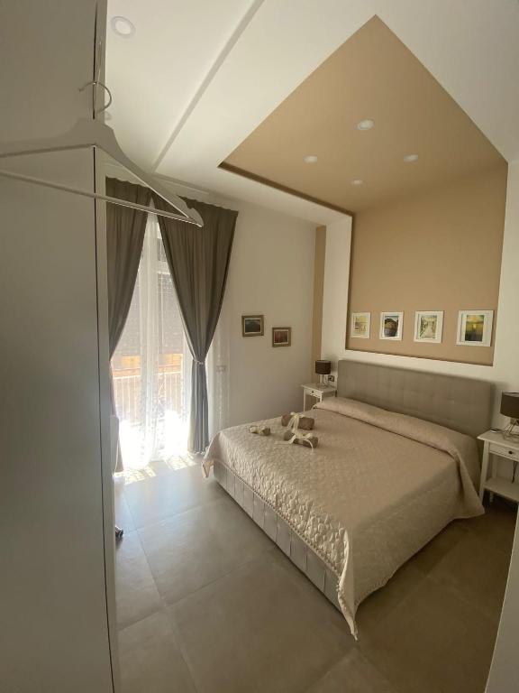 Postel nebo postele na pokoji v ubytování B&B 80056 Ercolano