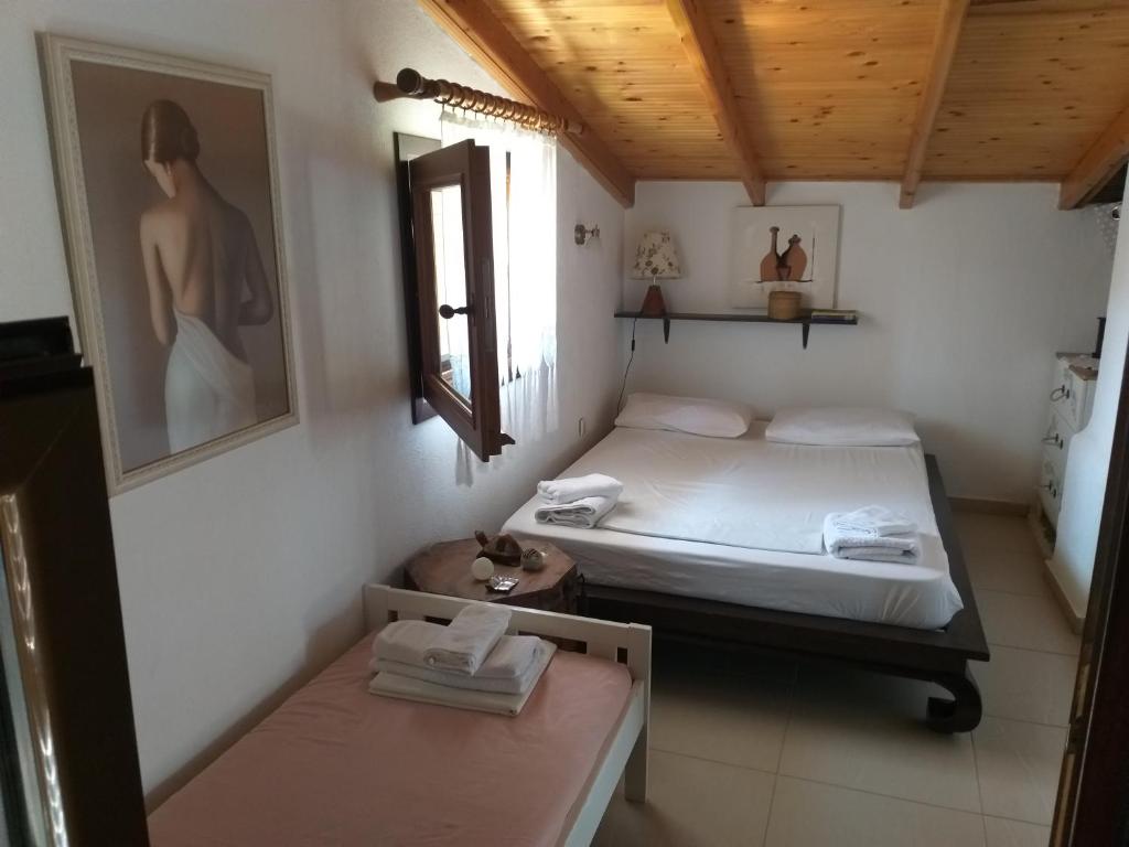 Postel nebo postele na pokoji v ubytování Minthi