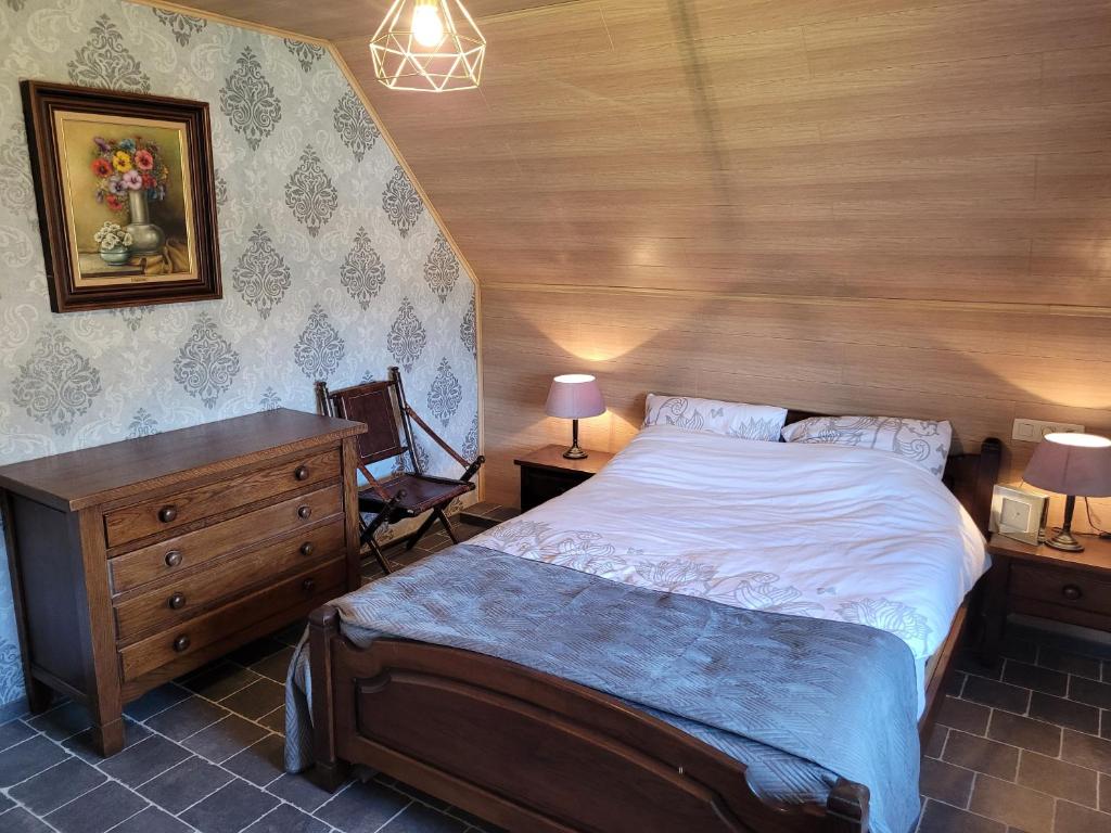 Postel nebo postele na pokoji v ubytování vakantiewoning hoeve 'd oude scheure