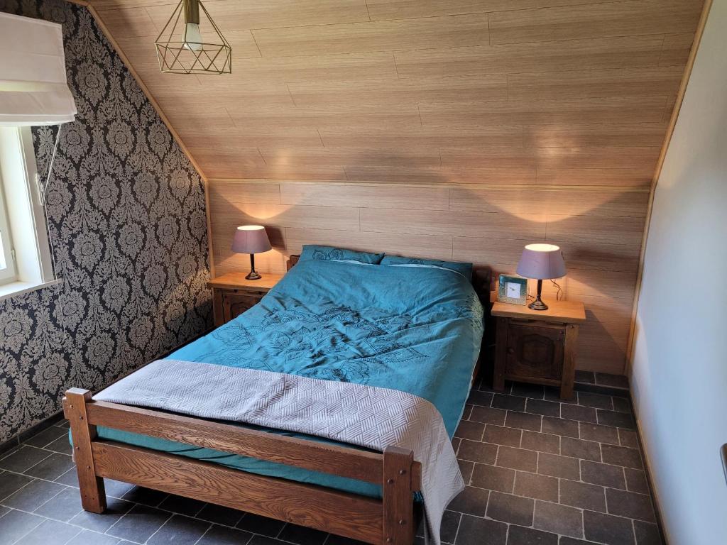 Postel nebo postele na pokoji v ubytování vakantiewoning hoeve 'd oude scheure