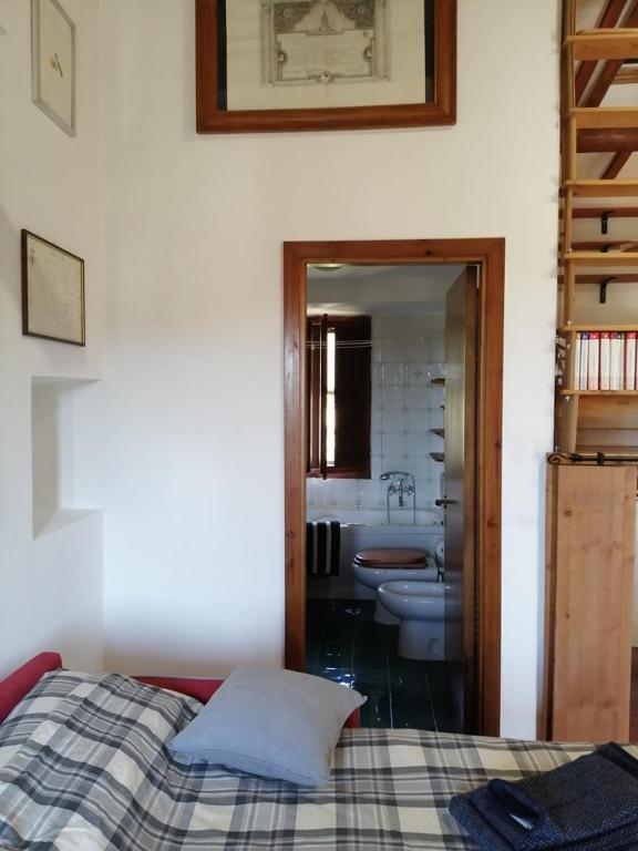 Posteľ alebo postele v izbe v ubytovaní Casa Gianfranco Millepapaverirossi