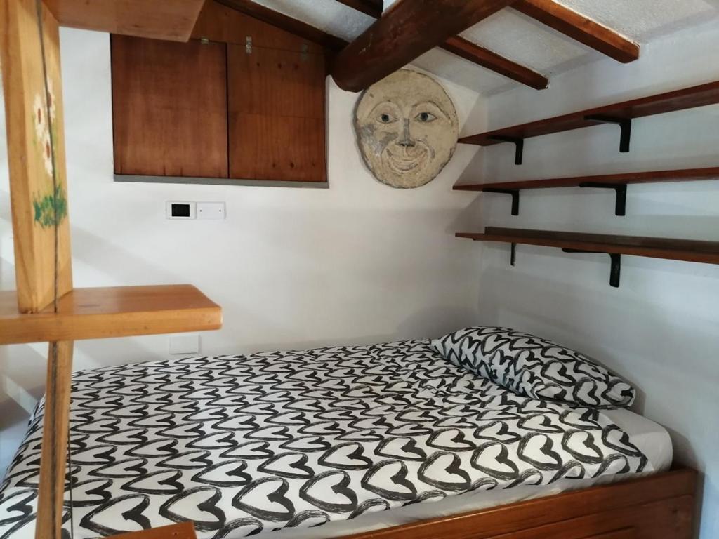 Posteľ alebo postele v izbe v ubytovaní Casa Gianfranco Millepapaverirossi