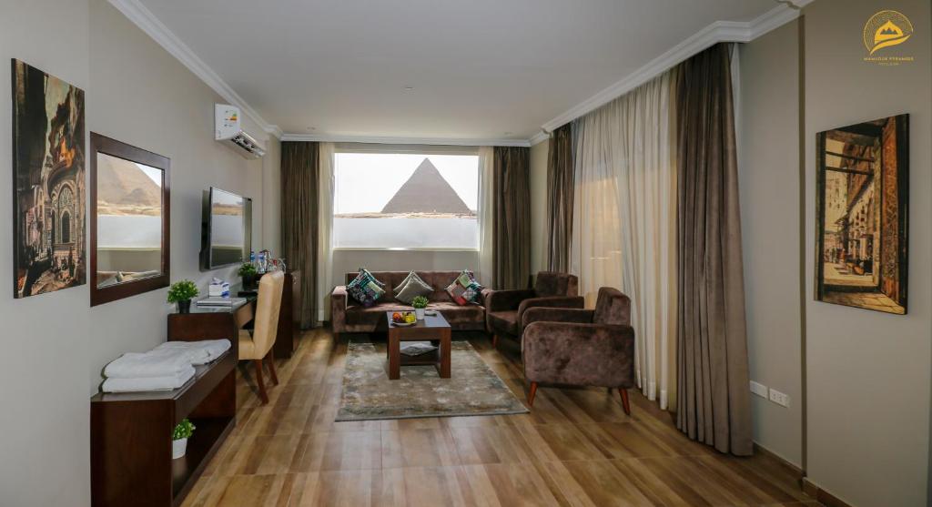 Area soggiorno di Mamlouk Pyramids Hotel