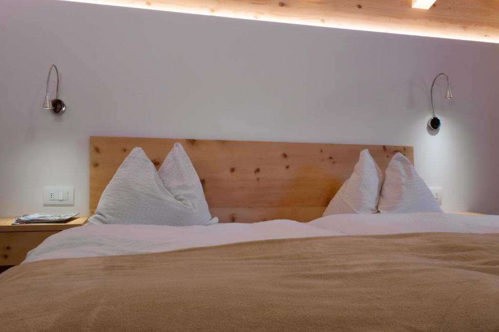 Postel nebo postele na pokoji v ubytování Apartments B&B Pretermo