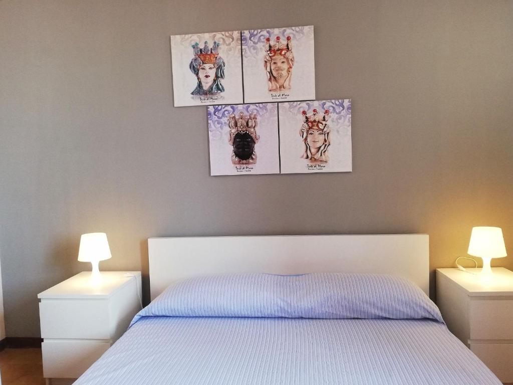 Posteľ alebo postele v izbe v ubytovaní Saracena Amuri Home