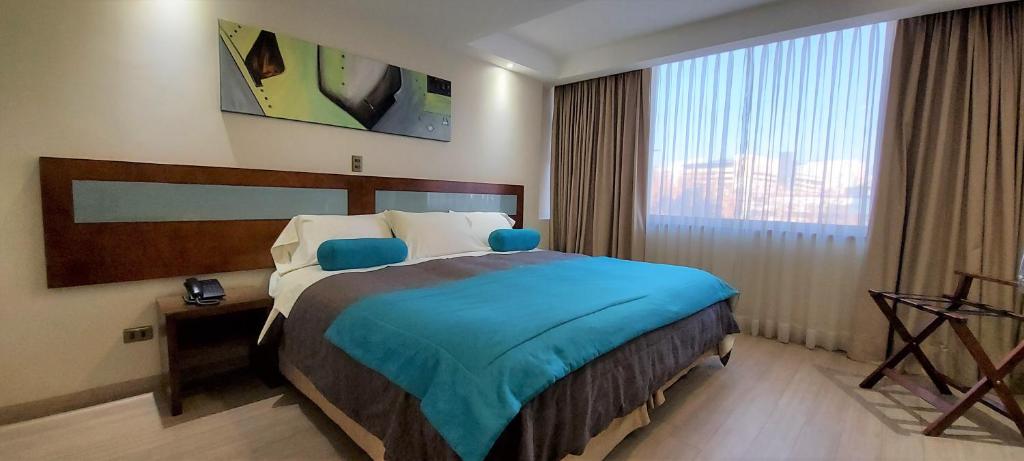 Postel nebo postele na pokoji v ubytování Hotel Libertador