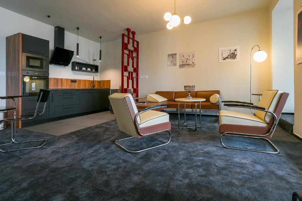 Kuchyň nebo kuchyňský kout v ubytování Hotel & Gallery Kopacka