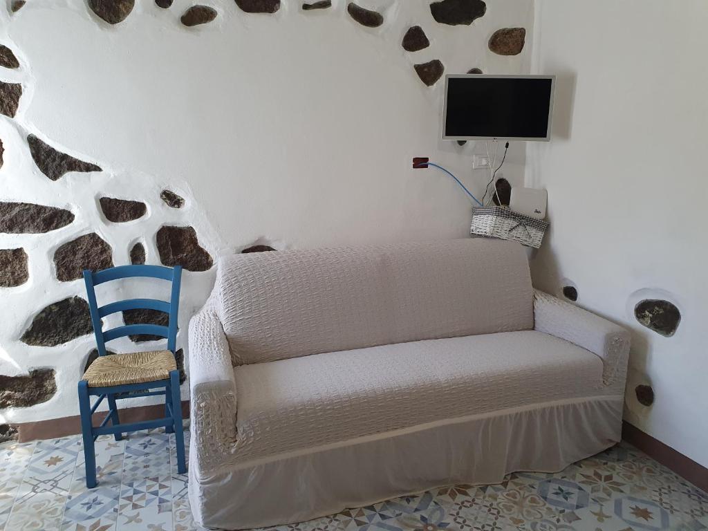 A television and/or entertainment centre at Casa Vacanza Sa Prenda
