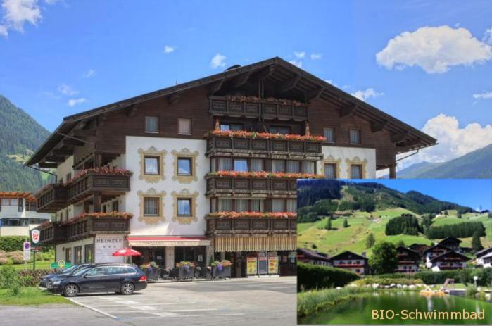 un edificio con un coche aparcado delante de él en Ferienappartements Heinzle - Ihr Ferienresort, en Sankt Jakob in Defereggen