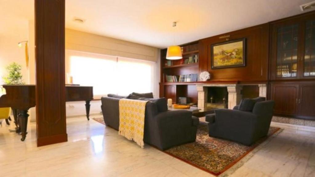 Posezení v ubytování VILLA CERCA DE LA PLAYA,PISCINA PRIVADA,BBq