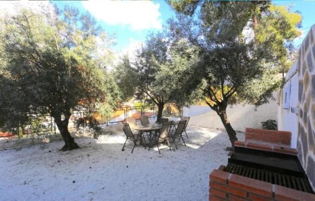 Zahrada ubytování VILLA CERCA DE LA PLAYA,PISCINA PRIVADA,BBq