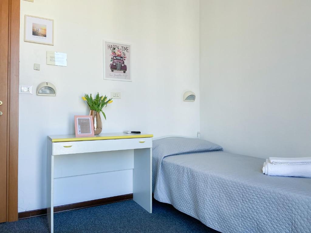 Postel nebo postele na pokoji v ubytování Hotel Berlino
