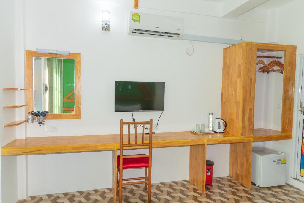 TV a/nebo společenská místnost v ubytování Chao Guest House
