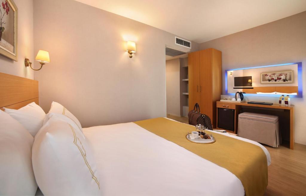 Postel nebo postele na pokoji v ubytování Almina Hotel - Special Class