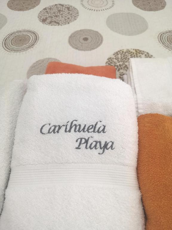Łóżko lub łóżka w pokoju w obiekcie Carihuela Playa Los Nidos 1