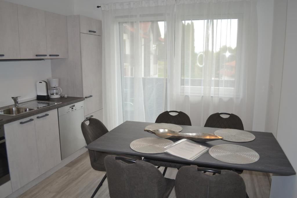 Kuchyň nebo kuchyňský kout v ubytování Apartment Uggowitzer