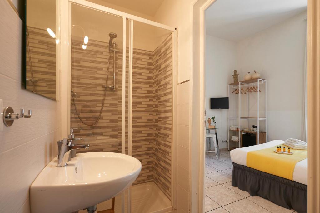 Posteľ alebo postele v izbe v ubytovaní 3B Bed & Breakfast Firenze Centro