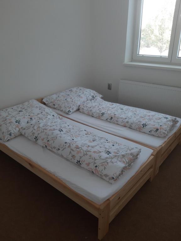 Posteľ alebo postele v izbe v ubytovaní Privátne ubytovacie zariadenie Bratislava širšie centrum