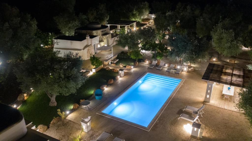Bazén v ubytování B&B Trulli Moonlight da Grace nebo v jeho okolí