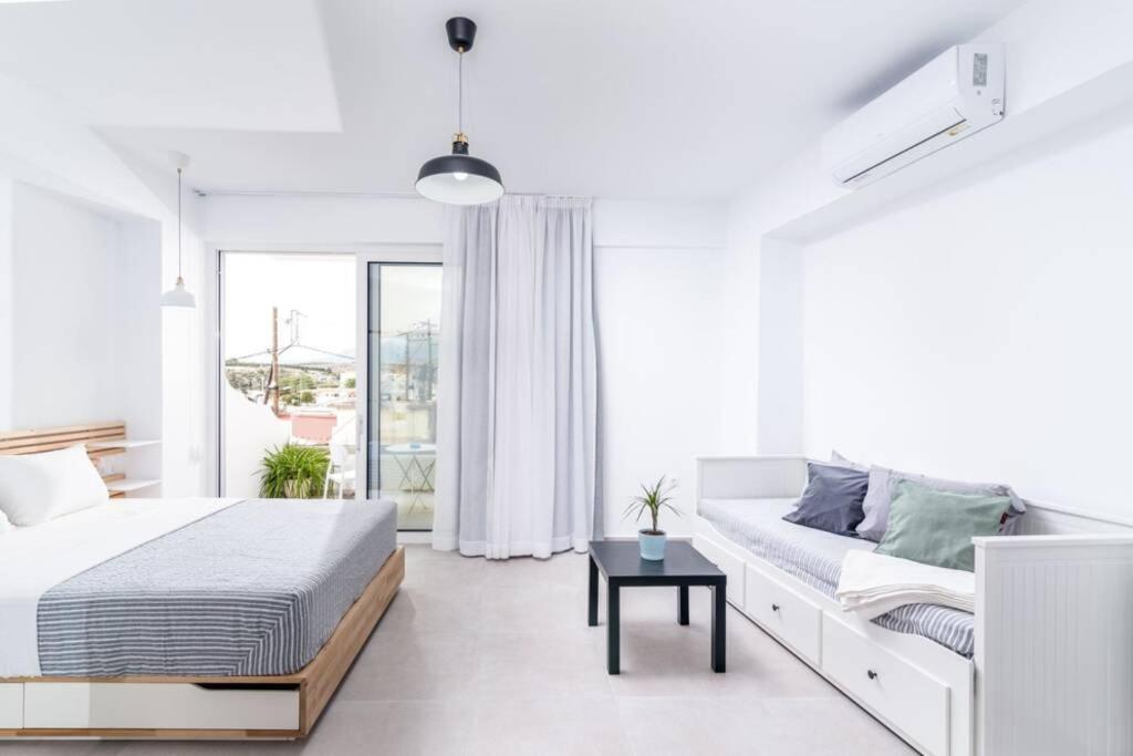 Postel nebo postele na pokoji v ubytování Maisonnette Giannis
