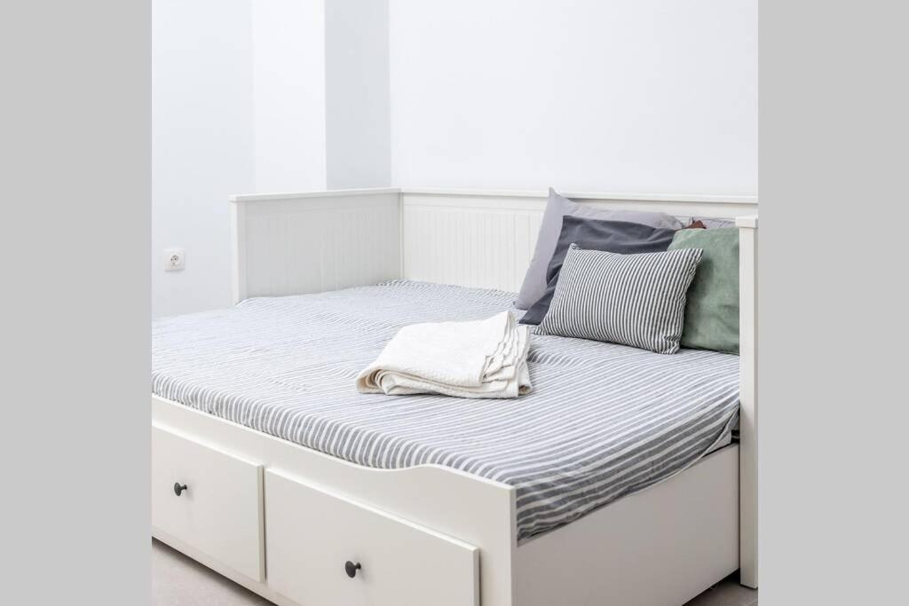 Postel nebo postele na pokoji v ubytování Maisonnette Giannis