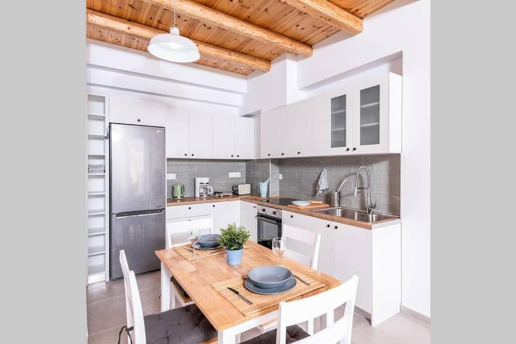 Kuchyň nebo kuchyňský kout v ubytování Maisonnette Giannis