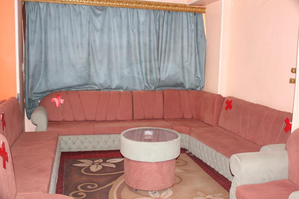 Posezení v ubytování Tiba Hotel