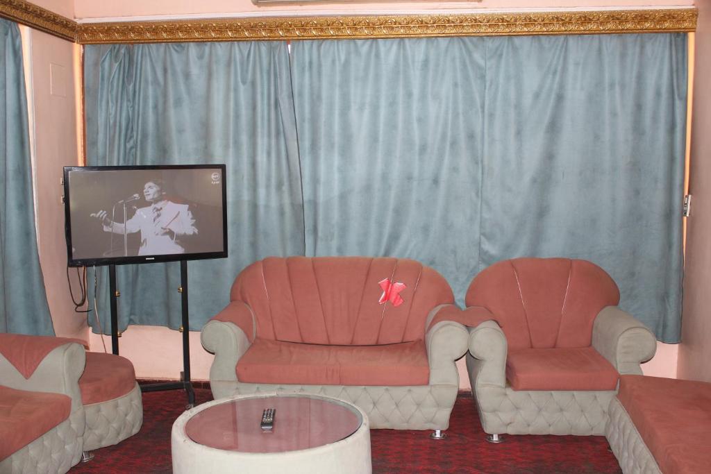Posezení v ubytování Tiba Hotel