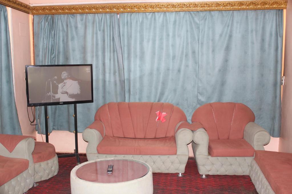 Posezení v ubytování Tiba Hotel